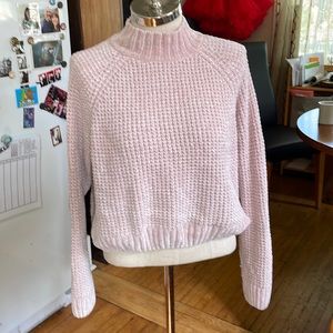Divided pink sweater
